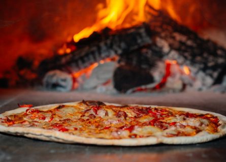 Pizza baked in wood burning oven