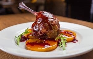Duck confit, typical dish in Biarritz bistros Duck confit, typical dish in Biarritz bistros