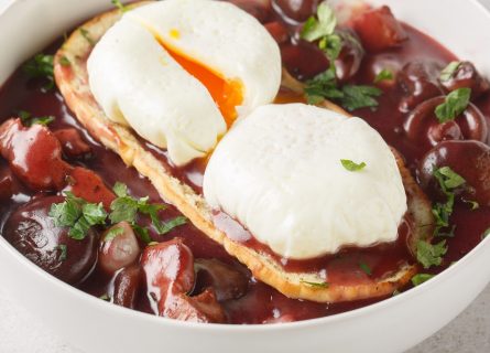 Oeufs en Meurette: A Classic Delight from Burgundy featuring Poached Eggs Draped in Rich Meurette Sauce