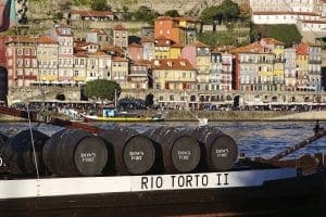 Casks of Port wine on Douro river Casks of Port wine on Douro river