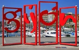 Gijon symbol red monument Gijon symbol red monument