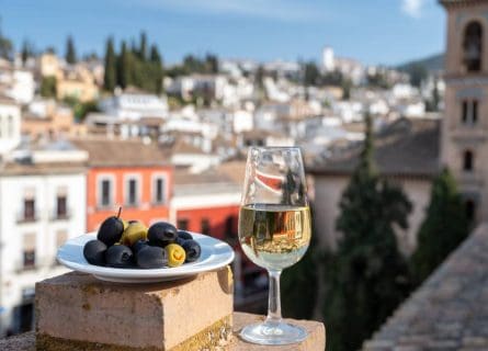 Savoring simplicity: a glass of sherry paired with earthy olives