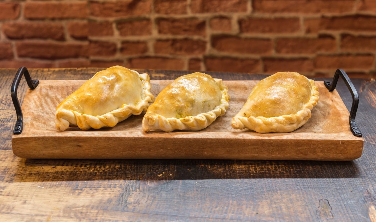 Empanadas: Traditional savory pastries filled with meat, vegetables, or cheese.